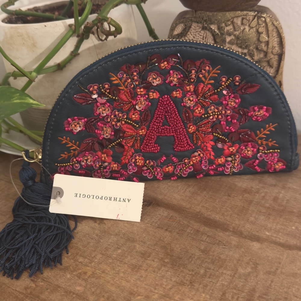 Anthropologie Satin Embellished "A" wallet with zippered tassel. New with Tag